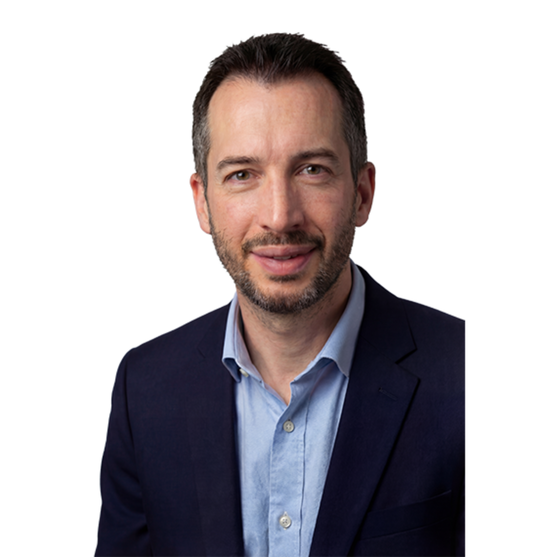 A professional studio portrait of consultant surgeon Mr John Henton, FRCS(Plast), at the Great North Lymphatic Centre, wearing a navy blue blazer and a light blue button-down shirt.